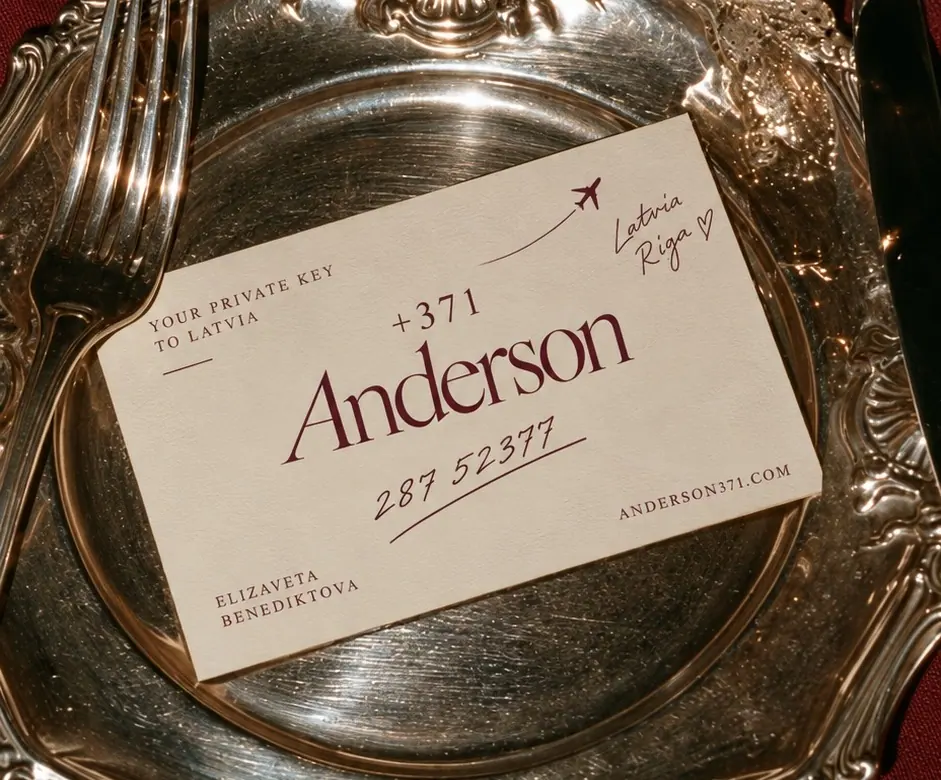 The +371 Anderson card resting on a silver plate.